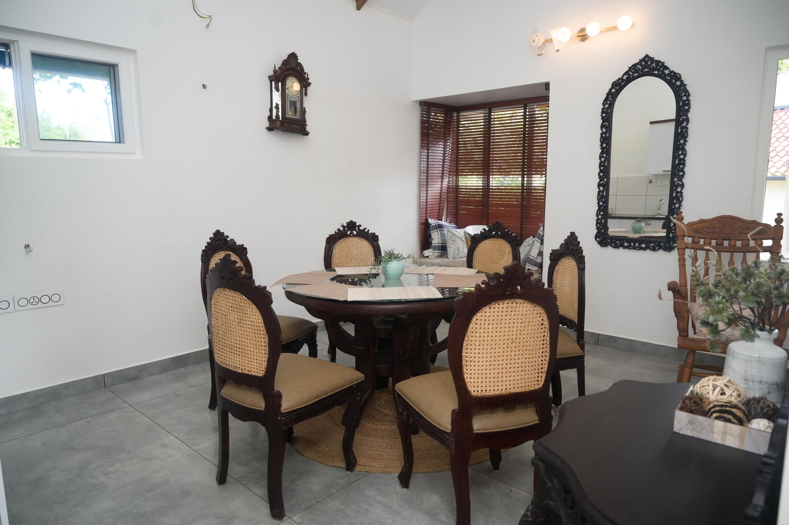 Dining area with carved chairs at Heyday Vagamon, Vagamon, Idukki, Kerala