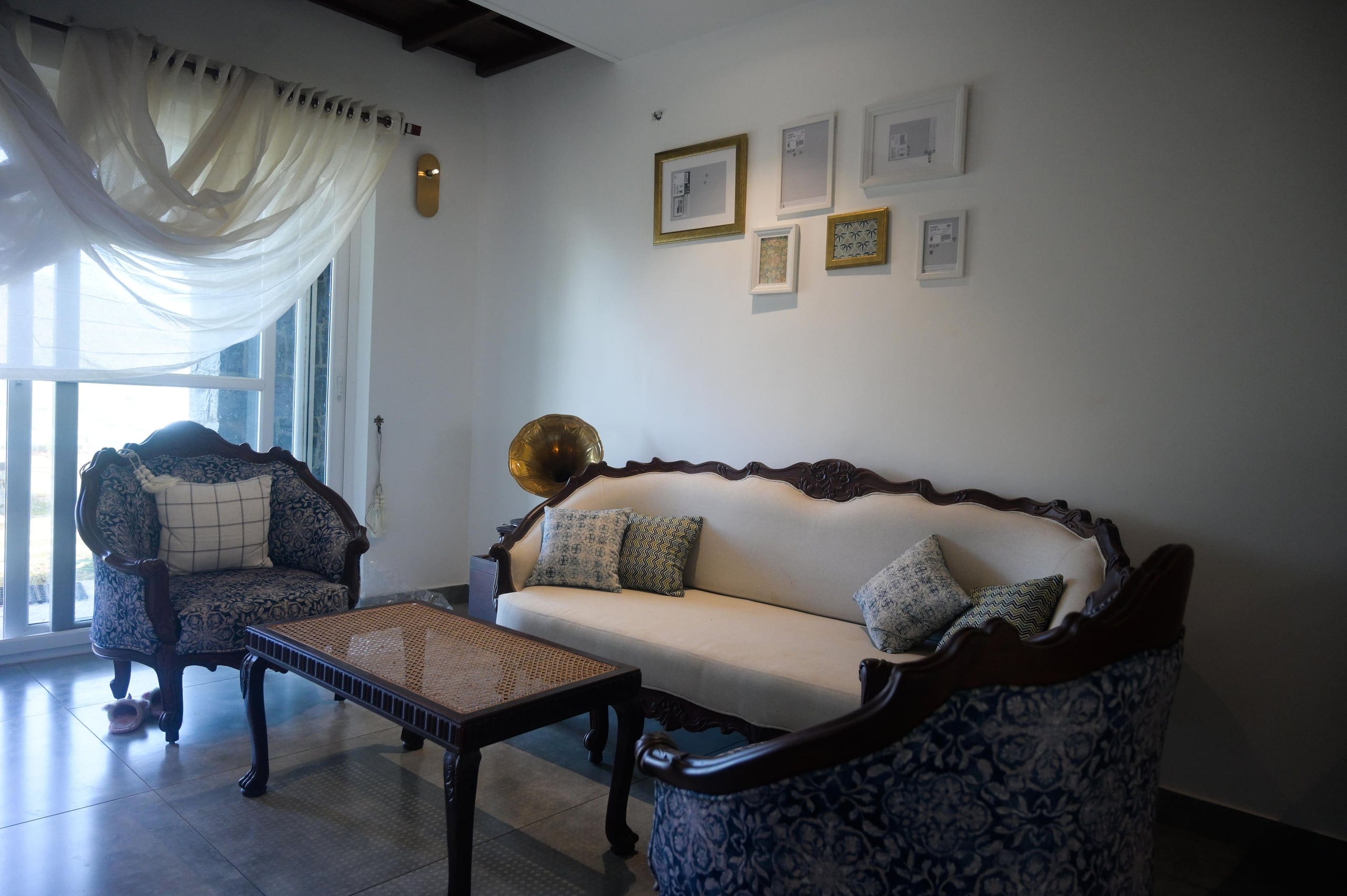 Living room with antique planter-era furniture at Heyday Vagamon, Vagamon, Idukki, Kerala